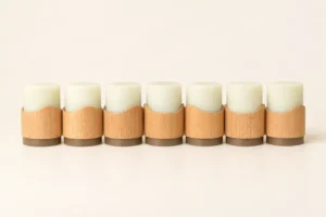 A 7-pack set of rechargeable flameless light cores paired with beech wood magnetic pods serving as power bases, offering 30-hour and 48-hour total runtime options.